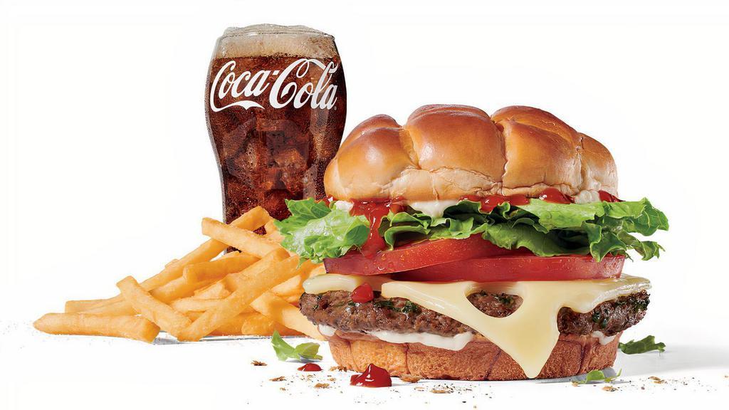 Large Classic Buttery Jack® W/Swiss Cheese Combo · Includes large French Fries and your choice of large drink.