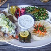 The Supreme Gyro Plate · Beef and lamb mix served with tabouli, hummus, choice of grape leaves or baba ghanouj, tzatz...