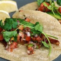 All Star Taco · Our ALL STAR BACON on top of spring mix and with pickled onion, avocado, house made salsa, a...