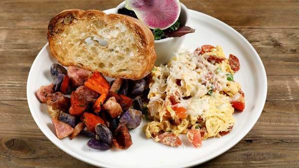 #3. Spanish Scramble · Andouille sausage, caramelized onions, tomatoes, green onions, and jack cheese.