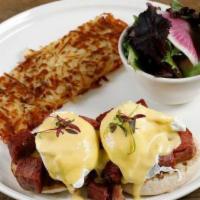 Corned Beef Benedict · 2 poached eggs, corned beef, hollandaise sauce on an English muffin served with 2 potato car...