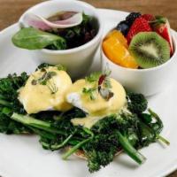 #23. Eggs Florentine · Two poached eggs, spinach, grilled broccolini and homemade hollandaise sauce on an English m...