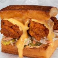 Cheesy Chick · Two crispy fried chicken tenders, spiced to your liking, Plain, Nashville Hot or Nashville H...