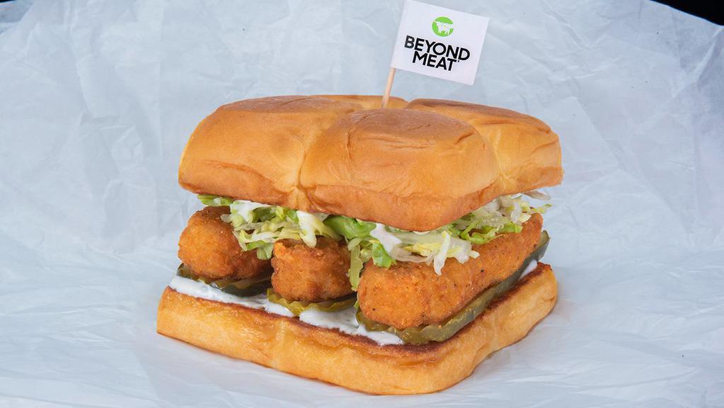 Beyond® Bad Mutha Clucka	 · Two crispy fried Beyond® tenders, spiced to your liking, Plain, Nashville Hot or Nashville Hotter with miso ranch, dill pickle slices and lettuce; served on King's Hawaiian rolls.