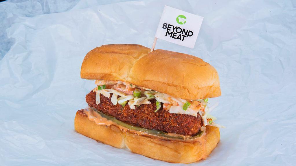 Beyond® The Hot Chick Slider · crispy fried beyond® tender, spiced to your liking: plain, nashville hot or nashville hotter; with secret sauce, dill pickle slices and slaw; served on king's hawaiian rolls
