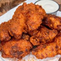 Wings · 6 crispy fried chicken wings, spiced to your liking: plain, nashville hot or nashville hotter