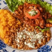  MOLE PLATE  · CHICKEN RED MOLE
AWARD WINNER
Home made Mole Sauce 
Served with : Rice, Pinto Beans and Sals...