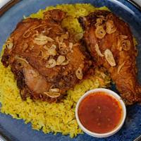 Hat Yai Chicken + Yellow Rice · Southern Thai Fried chicken, marinated in rich spices, topped with fried shallots + yellow r...