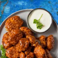 Boneless Buffalo Chicken Wings · Boneless chicken wings with a choice of your favorite wing style. Served with blue cheese or...