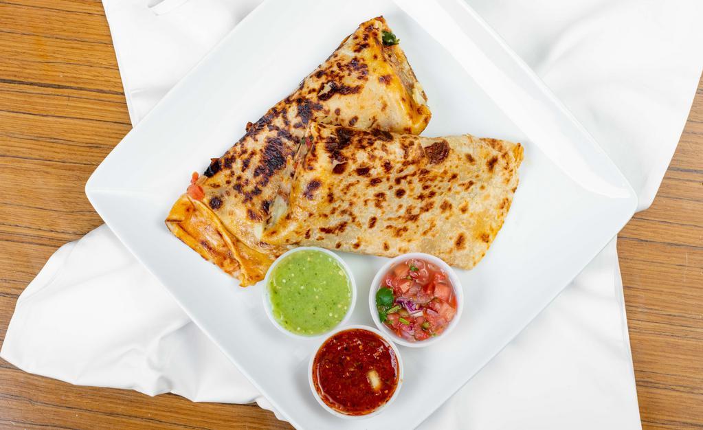 Suiza Quesadilla · Flour tortilla with any meat, cheese and salsa.