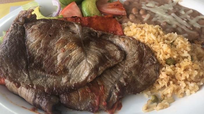 Carne Tampiqueña  · juicy steak with two cheese enchiladas.