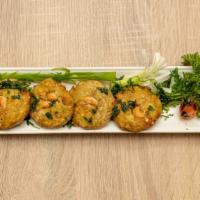 HARA BHARA KEBAB · Pan-fried patties loaded with spinach, peas, potatoes, spices and herbs.