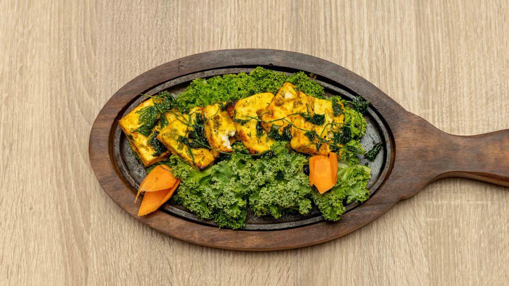 PANEER TIKKA · Cottage cheese marinated in hung curd and grilled in tandoor oven.