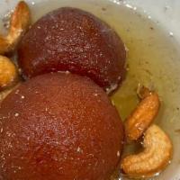 GULAB JAMUN · Deep fried milk dumplings and soaked in rose flavored syrup