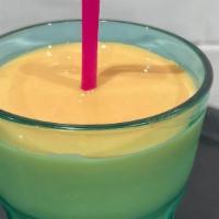 MANGO LASSI · Ripe mango blended into a creamy yogurt