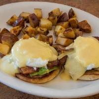 California Benedict · Applewood smoked bacon, tomato, avocado, 2 poached eggs and Hollandaise sauce on a grilled E...