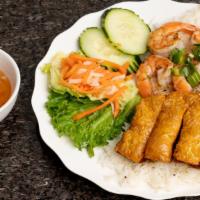 41. Cơm Bỏ or Tôm Tàu Hủ Ky · BBQ beef or BBQ shrimp with shrimp cake and steamed rice.