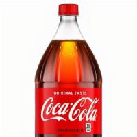 Bottled Soda · Selection of a variety of 20 oz bottled sodas (Coca Cola, Pepsi, Sprite, Minute Maid, Fanta,...