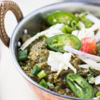 Saag Paneer · Spinach puree cooked with ginger, garlic, and fresh seasonings, served with choice of farmer...