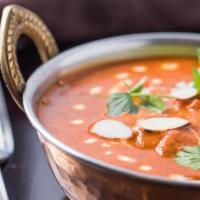 Butter Chicken · Shredded tandoori chicken cooked in luscious gravy flavored with fenugreek and homemade spic...