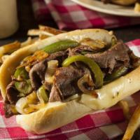 The Philly Steak Sandwich with Onions & Peppers · Mouthwatering sandwich made with tiny strips of steak, onions, peppers, and topped with melt...