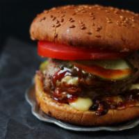 BBQ Cheeseburger · Freshly prepared Burger, topped with BBQ sauce, and customer's choice of cheese. Served with...