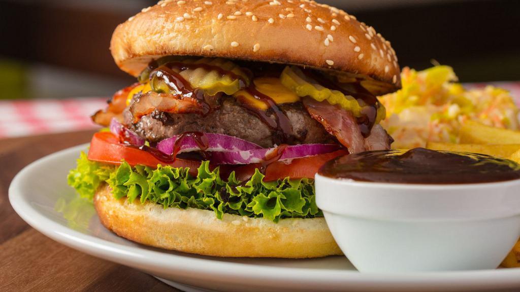 BBQ Bacon Cheeseburger · Freshly prepared Burger, topped with BBQ sauce, crispy bacon, and customer's choice of cheese. Served with customer's choice of additional toppings.