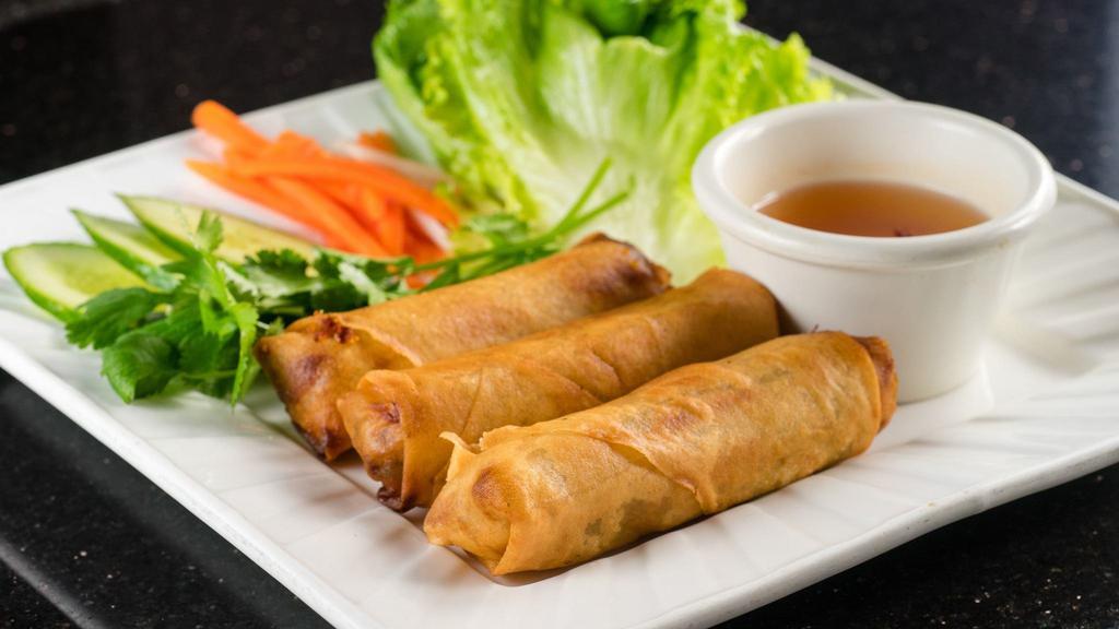 Imperial Rolls · 3 rolls. Mix of ground chicken, shrimp, crab meat, wood ear mushrooms, clear vermicelli, onions, and cilantro wrapped in egg flour paper. Seasoned and deep fried. Served with iceberg lettuce, pickled carrots, daikon, and fish sauce.