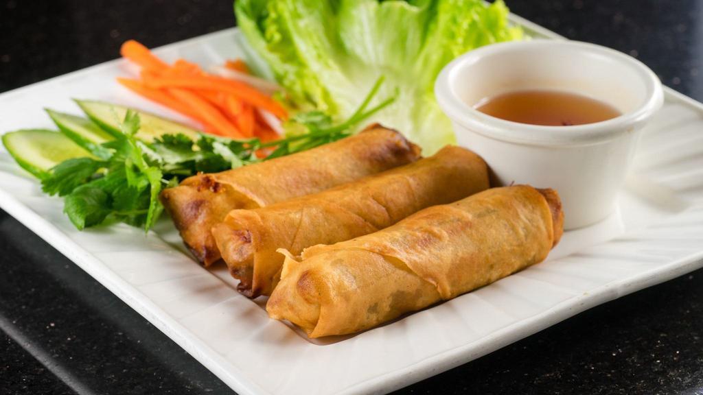 Veggie Imperial Rolls · 3 pieces. A julienned mixture of wood ear mushrooms, tofu, clear vermicelli, cilantro, imitation crab meat, sweet onions, and taro root wrapped in egg flower paper. Seasoned and deep fried. Served with a tangy soy sauce.