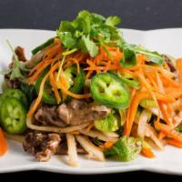 Spicy Beef Salad · Dinner Menu. Grilled beef tossed with pickled carrots, daikon, celery, and mint leaves in ou...