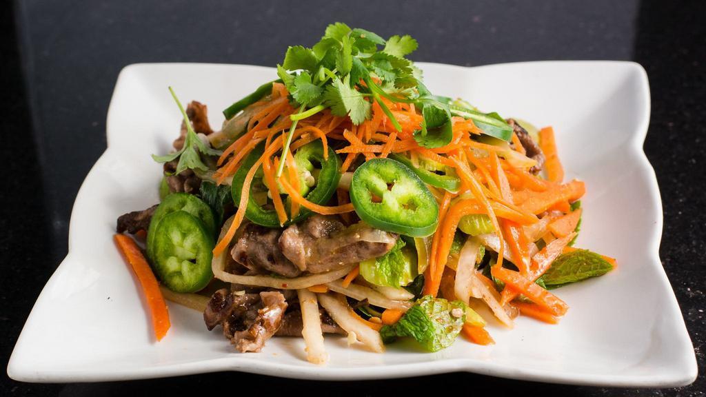 Spicy Beef Salad · Dinner Menu. Grilled beef tossed with pickled carrots, daikon, celery, and mint leaves in our spicy smoke flavored salad dressing.