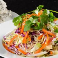 Chicken Salad · Strips of chicken breast tossed with red and white cabbage, pickled carrots, daikon, celery,...