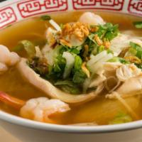 Prawns 'n Chicken Noodle Soup · Prawns and stripes of chicken with rice noodles, bean sprouts and lettuce in a chicken and s...