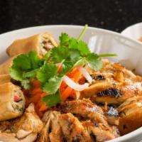 Vermicelli Bowl #8 · Choice of marinated grilled beef, pork or chicken with two imperial rolls over vermicelli.