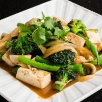 Mix Veggie, Tofu Lemongrass  · Fresh tofu sautéed with broccoli, mushrooms, zucchini, bluelake beans, and onions in our spi...