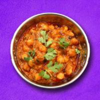 Gusto Garbanzo (Vegan)  · Chickpeas, boiled and simmered to perfection in a gently spiced onion & tomato curry