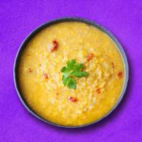 Light Lentils  (Vegan) · Yellow lentils cooked with spices, onion, tomato and topped with coriander leaf.