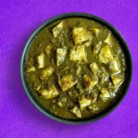 Aloo Palak · Potato cooked in thick spinach gravy, made with chopped onion, juicy tomato and spices .
