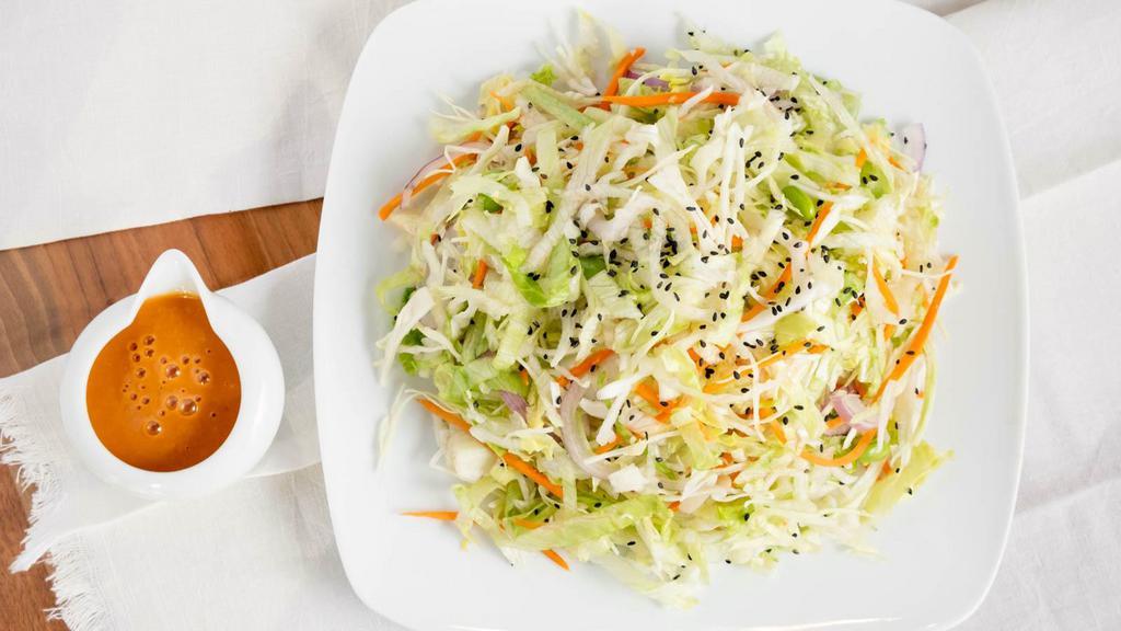 Fresh Mix Salad (Full) · Shredded lettuce, shredded cabbage, julienne carrots, julienne onions, edamame beans, and toasted black sesame, and our house made dressing.