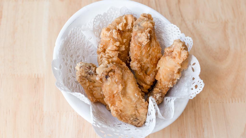 Fried Chicken Wings (5 Pieces) / 炸鸡翅 · Deep fried chicken wings lightly salted and peppered. Served with sweet and sour sauce.