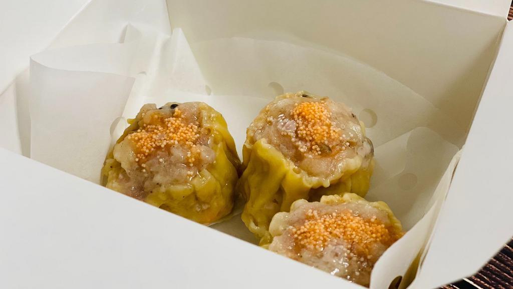 Shu Mai (3) 烧卖 · Canton style ground pork with shrimp and ginger wrapped in wonton skin served with house sauce.
