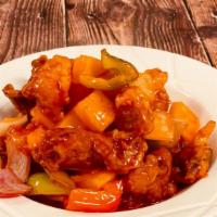 Sweet & Sour Chicken / 古老鸡  · Deep-fried chicken nuggets stir-fried with pineapple, bell peppers and white onions in sweet...