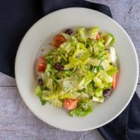 Greek Salad · Romaine lettuce, tomatoes, kalamata olives, cucumbers, green peppers, feta cheese tossed wit...