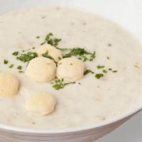 New England Clam Chowder · Our version of an east coast tradition is a creamy, rich chowder, with tender clams and hear...