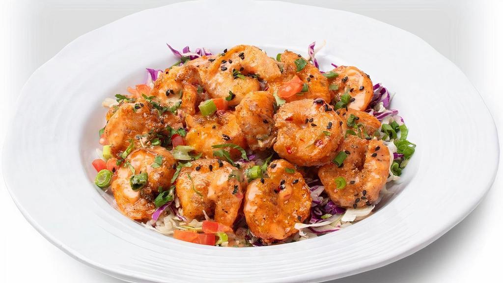 Dynamite Shrimp Bowl · Quick-fried shrimp in our dynamite sauce with fresh cilantro, green onions, tomatoes, red/green cabbage mix and sesame soy sauce. It isn’t named after an explosive device for nothing!