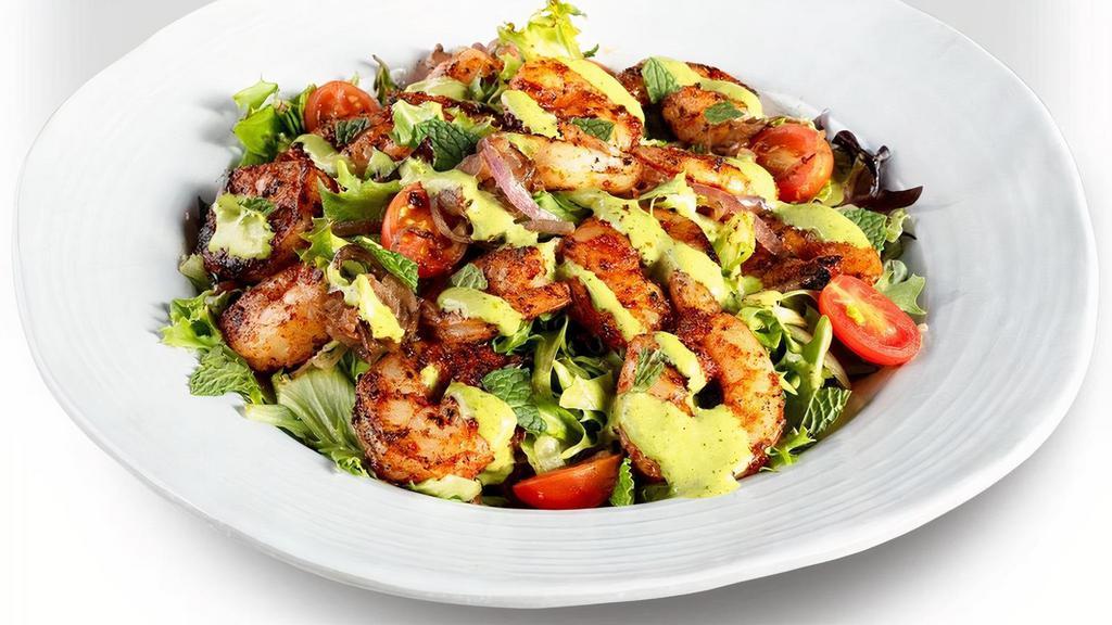 Keto Shrimp Bowl · Seasoned shrimp served over a bed of spring mix with tomatoes, onions and a creamy Green Goddess dressing, topped with fresh mint & parsley.. Low carb and satisfying.