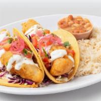 Battered Fish Taco Combo · Battered fish, cream sauce. **Delivery orders will receive bottled water instead of fountain...