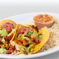 Cajun Fish Taco Combo · Roasted corn, cilantro sauce. **Delivery orders will receive bottled water instead of founta...