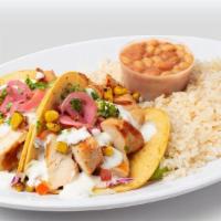 Grilled Chicken Taco Combo · Roasted corn, cream sauce. **Delivery orders will receive bottled water instead of fountain ...