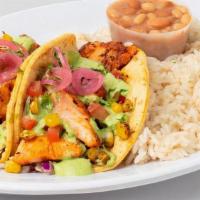 Cajun Salmon Taco Combo · Roasted corn, cilantro sauce. **Delivery orders will receive bottled water instead of founta...
